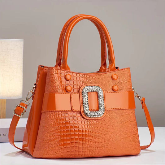 Cartera Bucket Estampado Lagarto con Bandolera