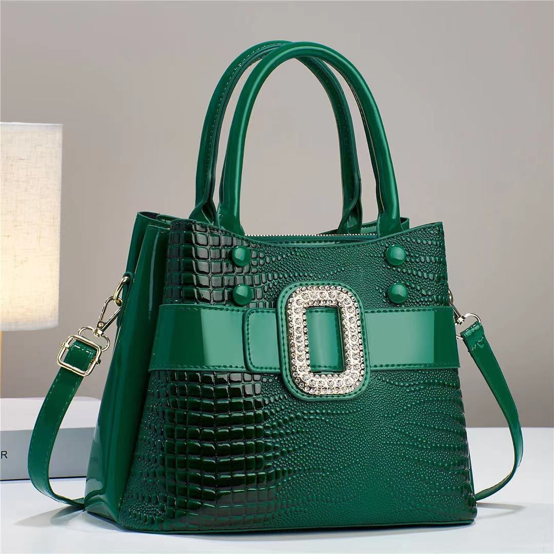 Cartera Bucket Estampado Lagarto con Bandolera