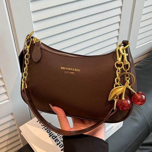Cartera Dumpling con Cadena y Dije